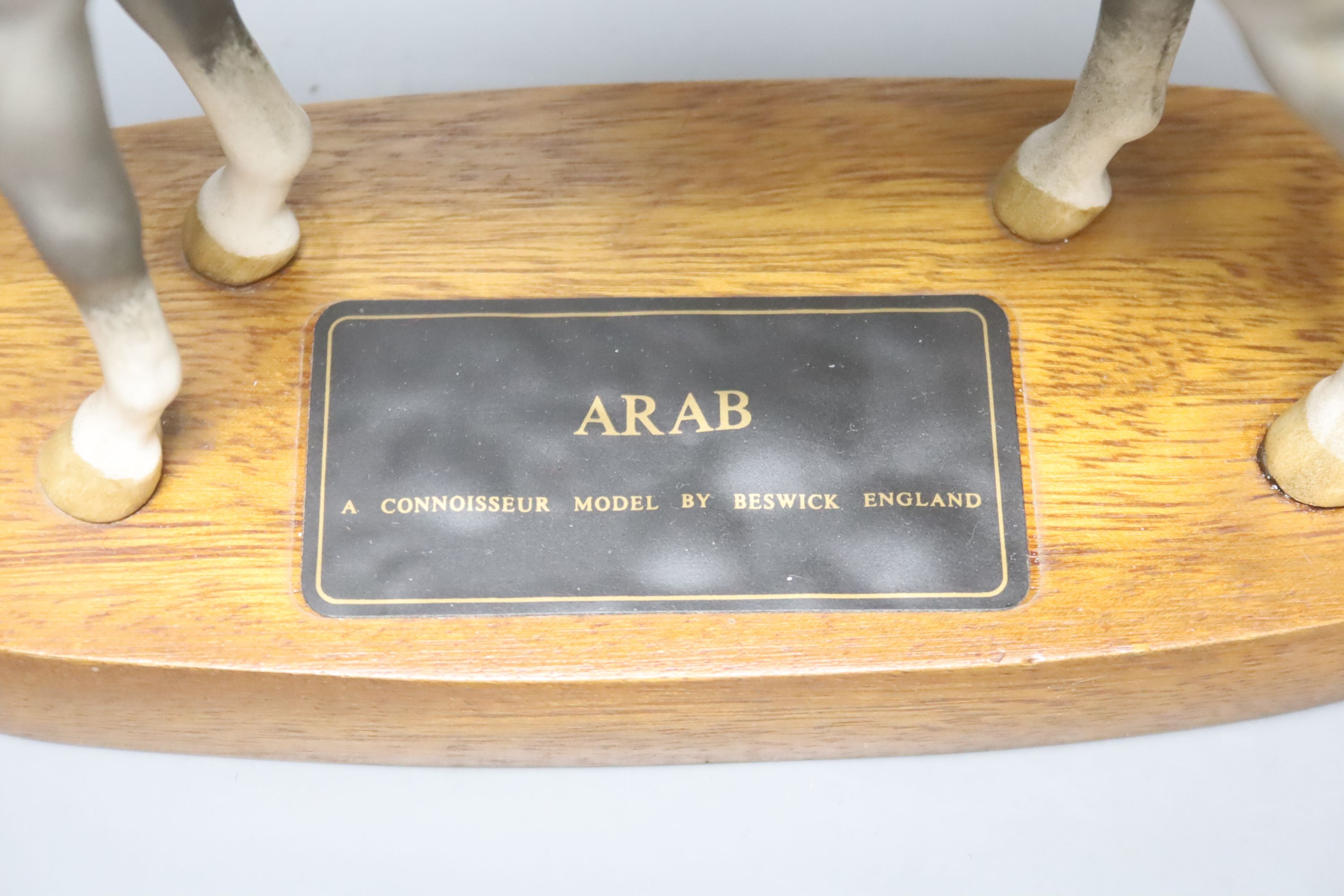 A Beswick Connoisseur Hunter and a similar Arab horse, tallest 32cm